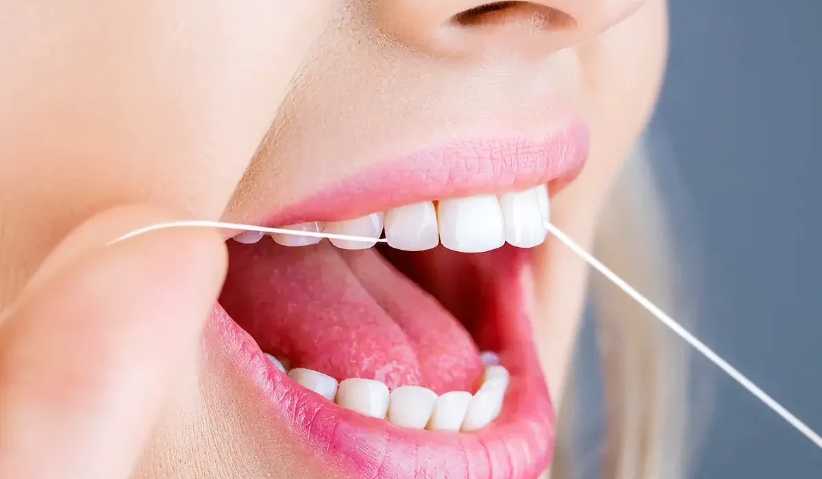 Flossing Her Teeth Flossing Her Teeth