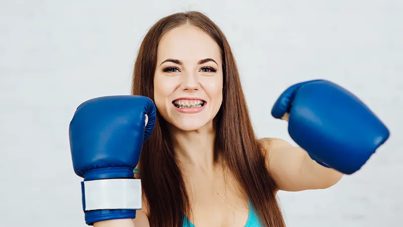 boxing with teeth braces